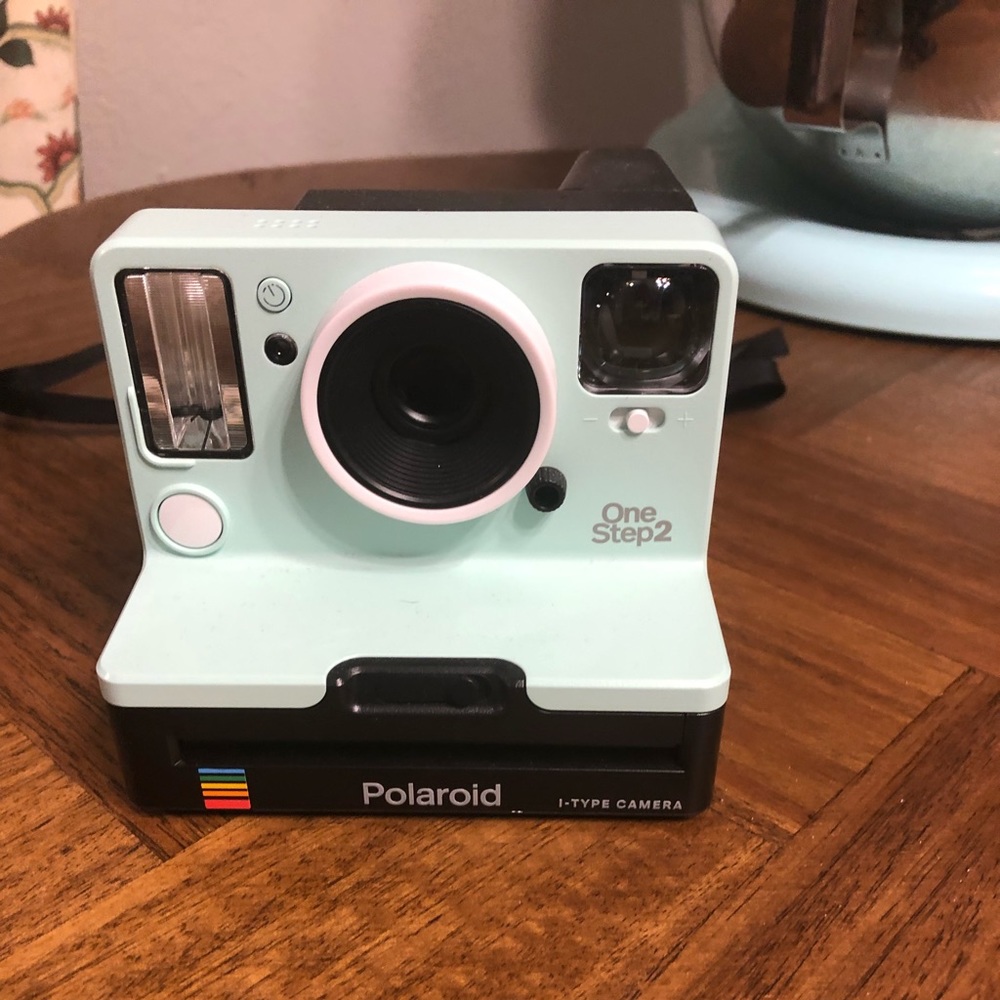 Turquoise one step Polaroid camera